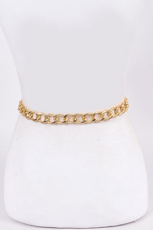 Chunky Chain Accent Iconic Belt featuring a stylish design with a durable polyurethane and mixed metal construction.