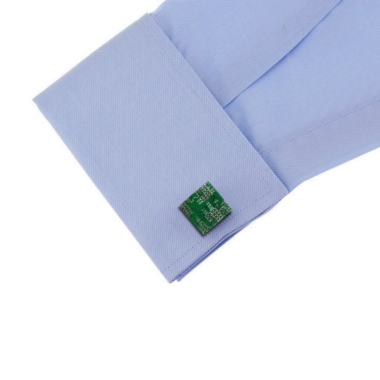 A pair of stylish Circuit Board Cufflinks made from authentic circuit board and stainless steel, featuring a polished rhodium finish, displayed in a gift box.