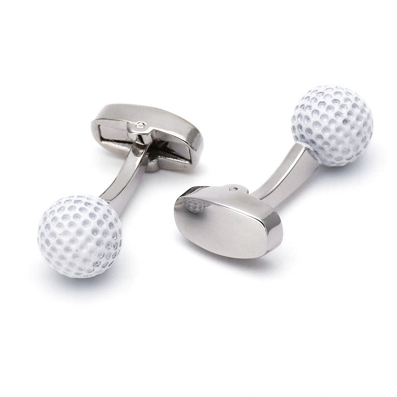 A pair of stainless steel golf ball cufflinks, hand-painted, displayed in a luxury presentation box, showcasing their unique design.