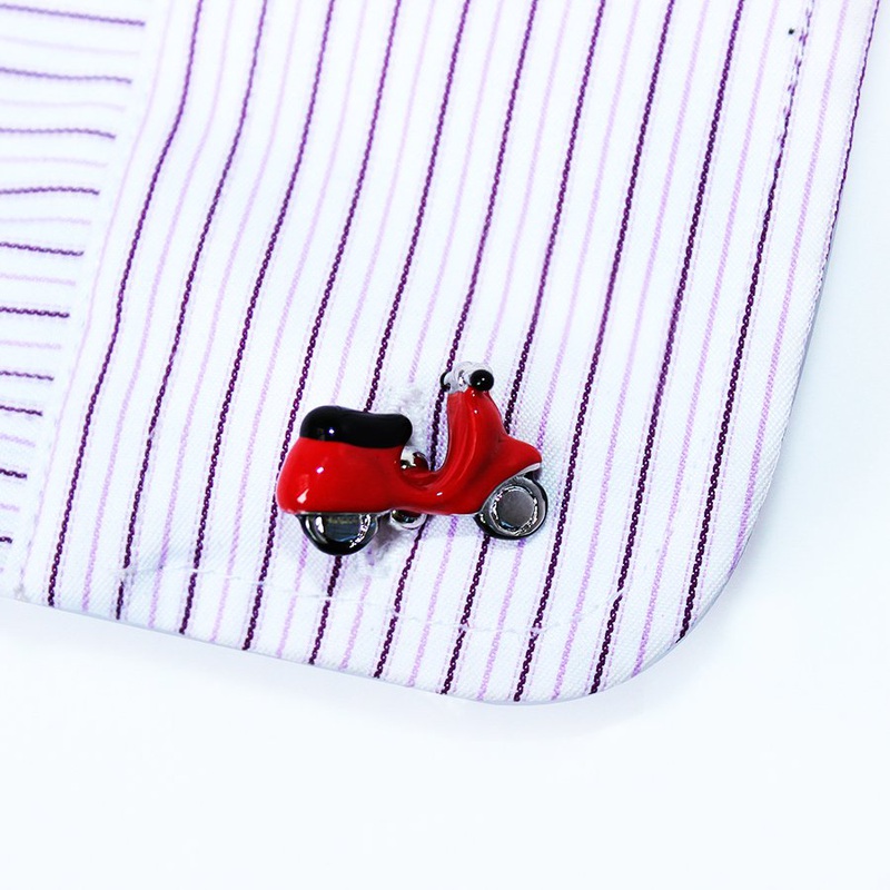 A pair of stylish motorcycle cufflinks made from stainless steel and rhodium plated, presented in a hard-sided gift box.