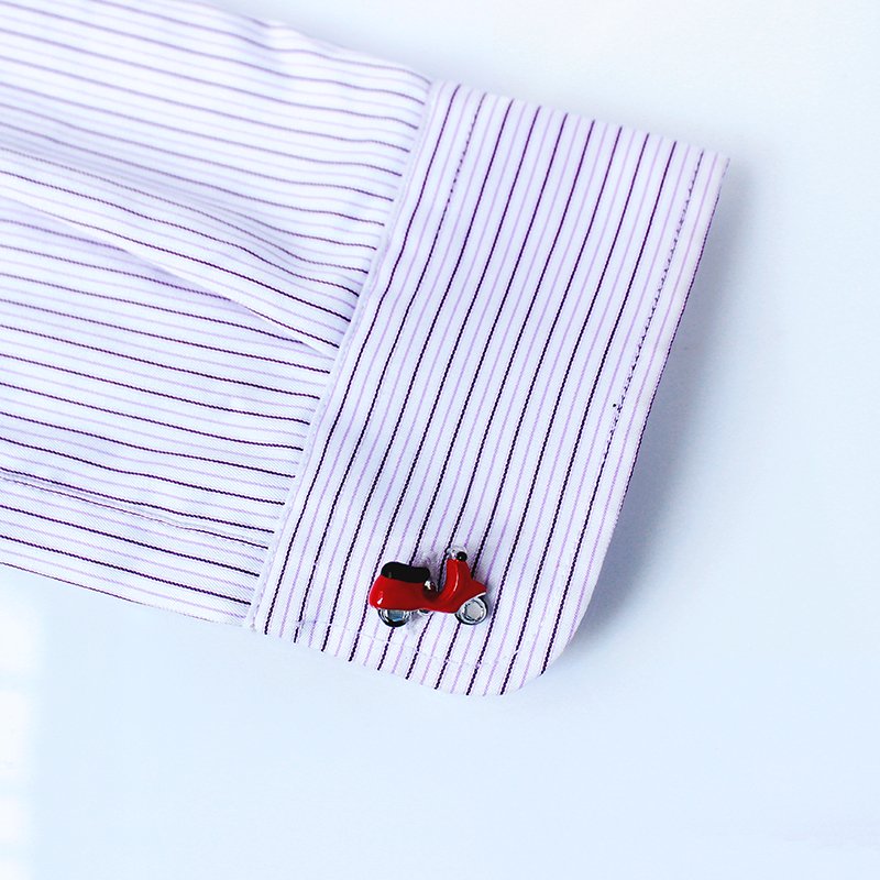 A pair of stylish motorcycle cufflinks made from stainless steel and rhodium plated, presented in a hard-sided gift box.