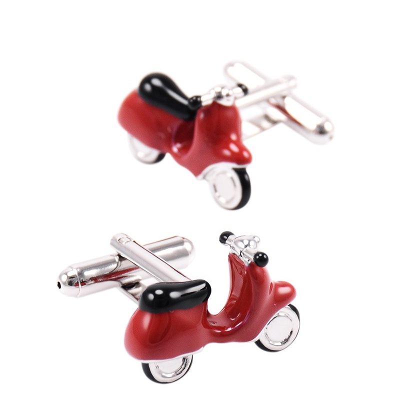 A pair of stylish motorcycle cufflinks made from stainless steel and rhodium plated, presented in a hard-sided gift box.
