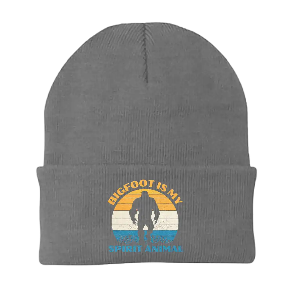 A stylish embroidered beanie featuring the phrase 'Bigfoot Is My Spirit Animal', made from a soft cotton-acrylic blend, perfect for casual wear.