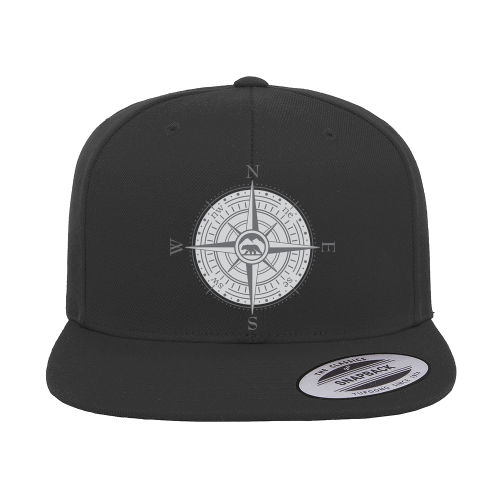 Compass Camping Embroidered Flat Bill Cap featuring a structured design, green under visor, and adjustable snapback closure.