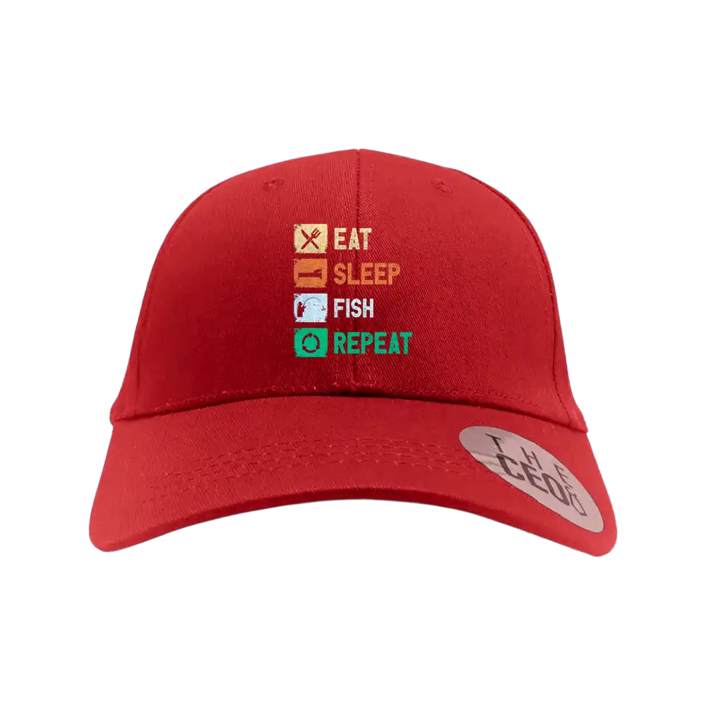 Eat Sleep Fishing Repeat Printed Baseball Hat featuring a catchy fishing-themed design, made from 100% cotton with a snapback closure.