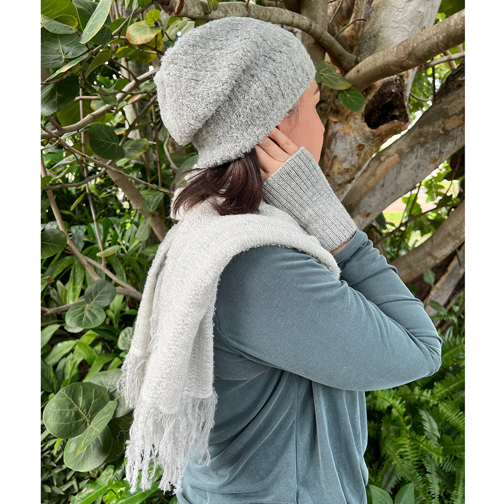 Gray Loop Knit Alpaca Beanie showcasing its soft texture and slouchy design, perfect for winter wear.