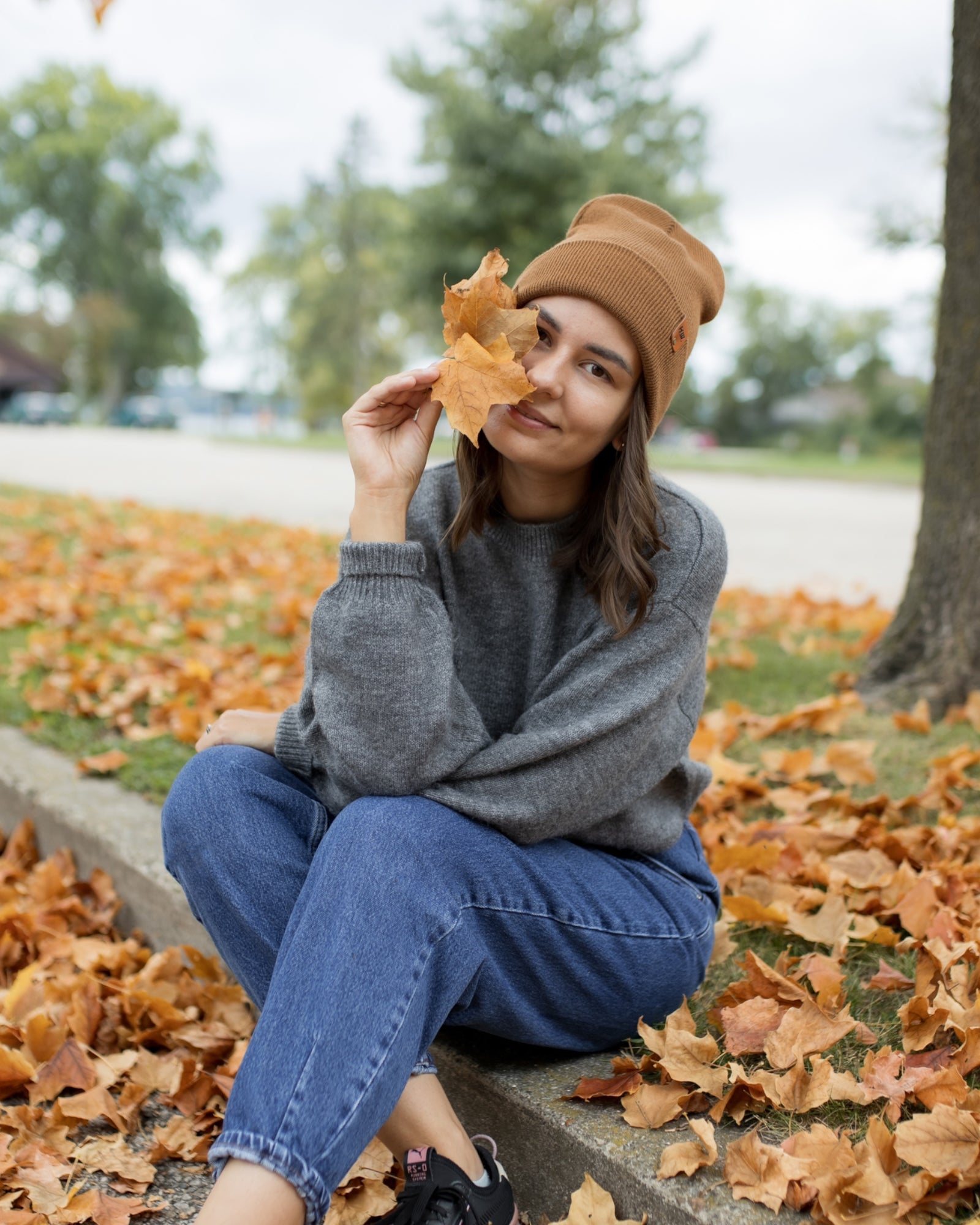 HAAKWEAR Knit Cuffed Beanie in Camel Brown, showcasing its stylish design and soft texture.