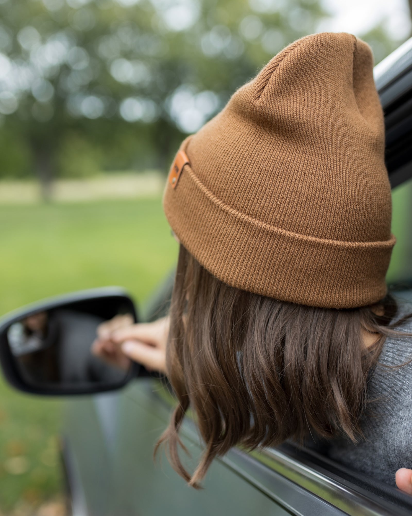 HAAKWEAR Knit Cuffed Beanie in Camel Brown, showcasing its stylish design and soft texture.