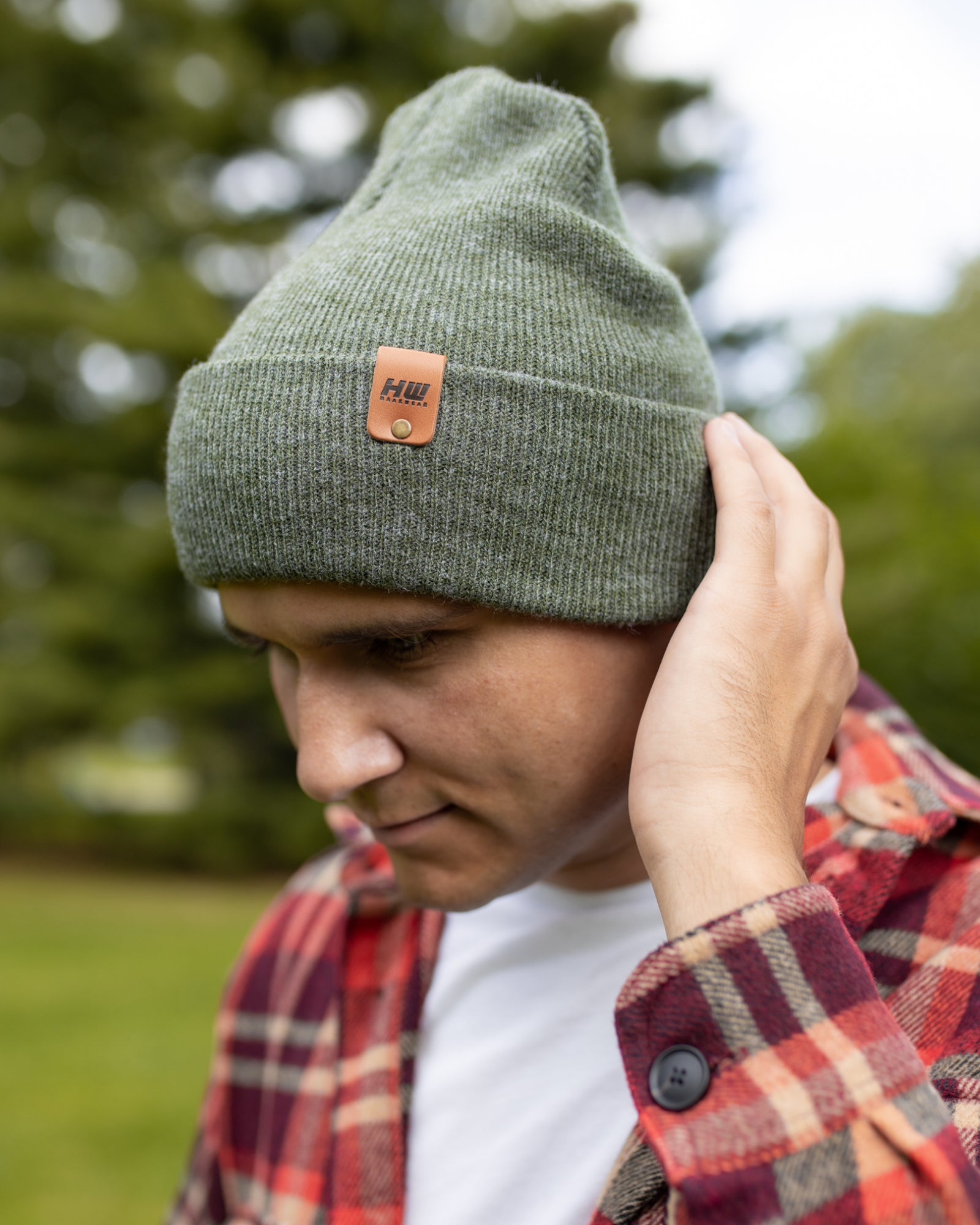HAAKWEAR Knit Cuffed Beanie in Forest Green, showcasing its stylish design and quality craftsmanship.