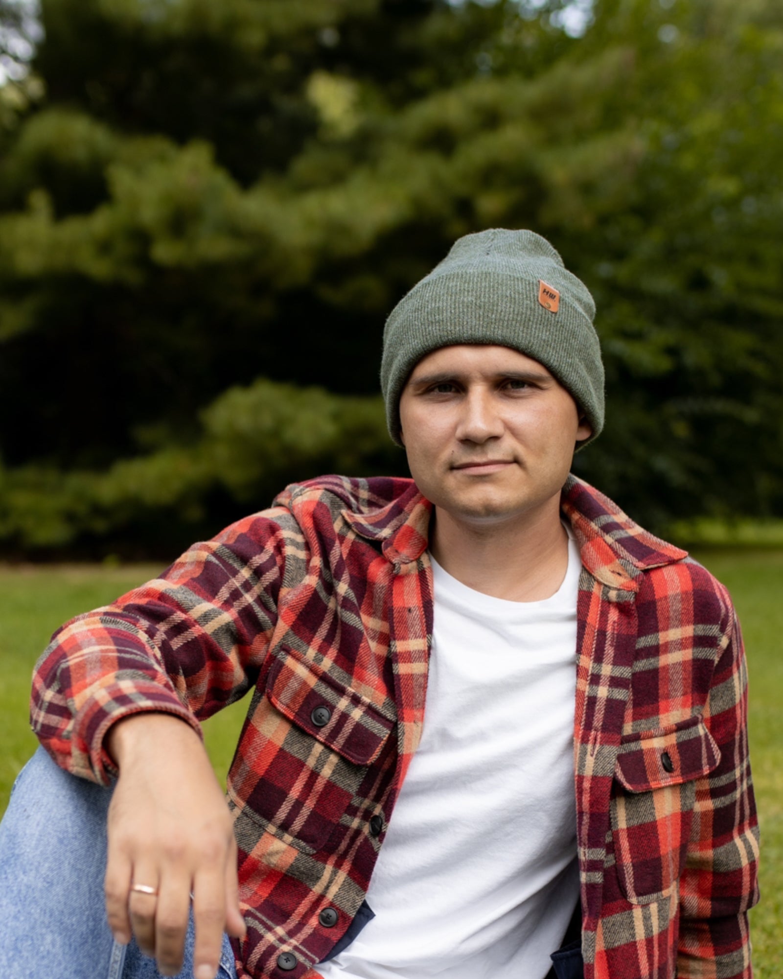 HAAKWEAR Knit Cuffed Beanie in Forest Green, showcasing its stylish design and quality craftsmanship.