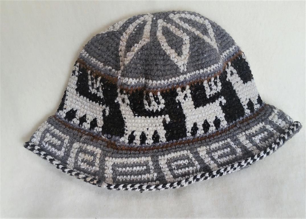 Hand Crochet Roll Up Rustic Alpaca Hat featuring unique patterns and cute alpaca designs, handmade in Peru, warm and comfortable for all ages.