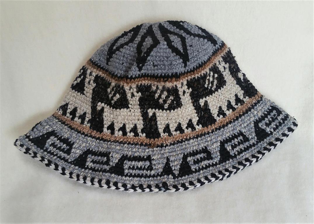 Hand Crochet Roll Up Rustic Alpaca Hat featuring unique patterns and cute alpaca designs, handmade in Peru, warm and comfortable for all ages.