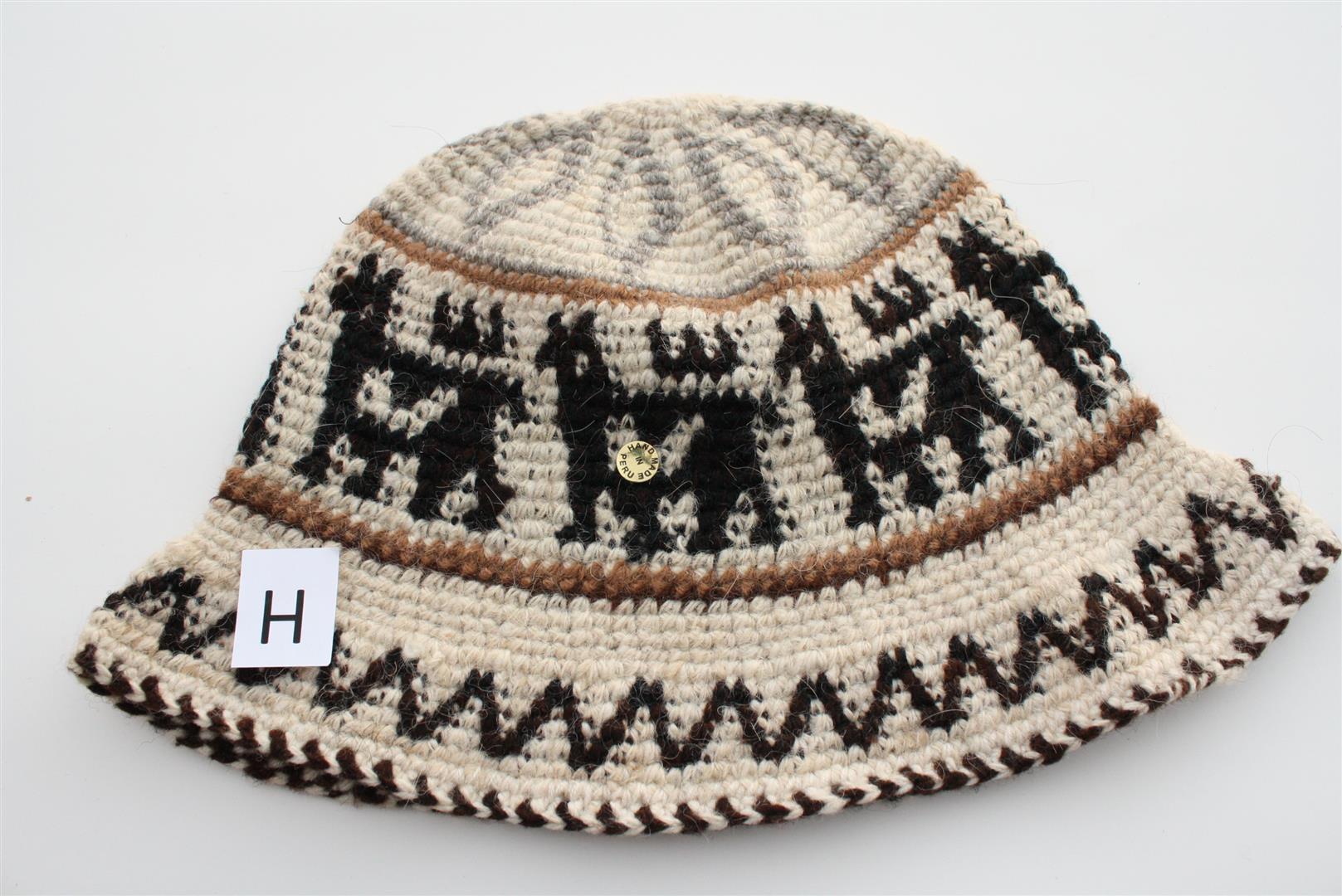 Hand Crochet Roll Up Rustic Alpaca Hat featuring unique patterns and cute alpaca designs, handmade in Peru, warm and comfortable for all ages.