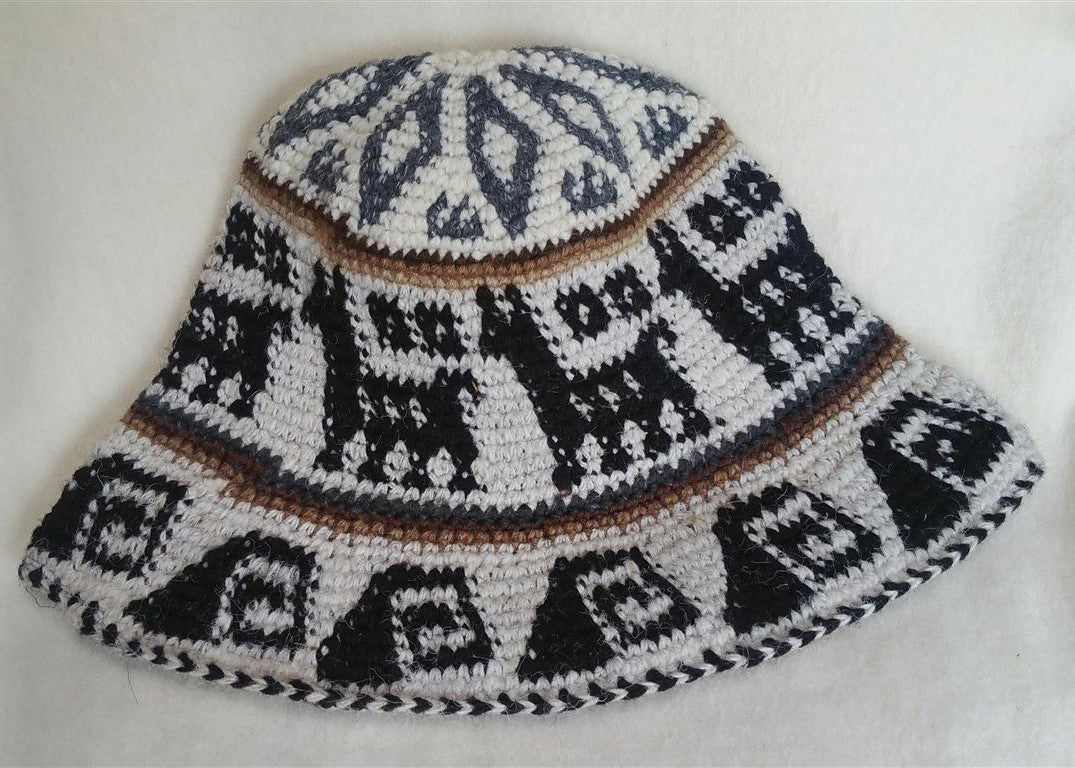 Hand Crochet Roll Up Rustic Alpaca Hat featuring unique patterns and cute alpaca designs, handmade in Peru, warm and comfortable for all ages.