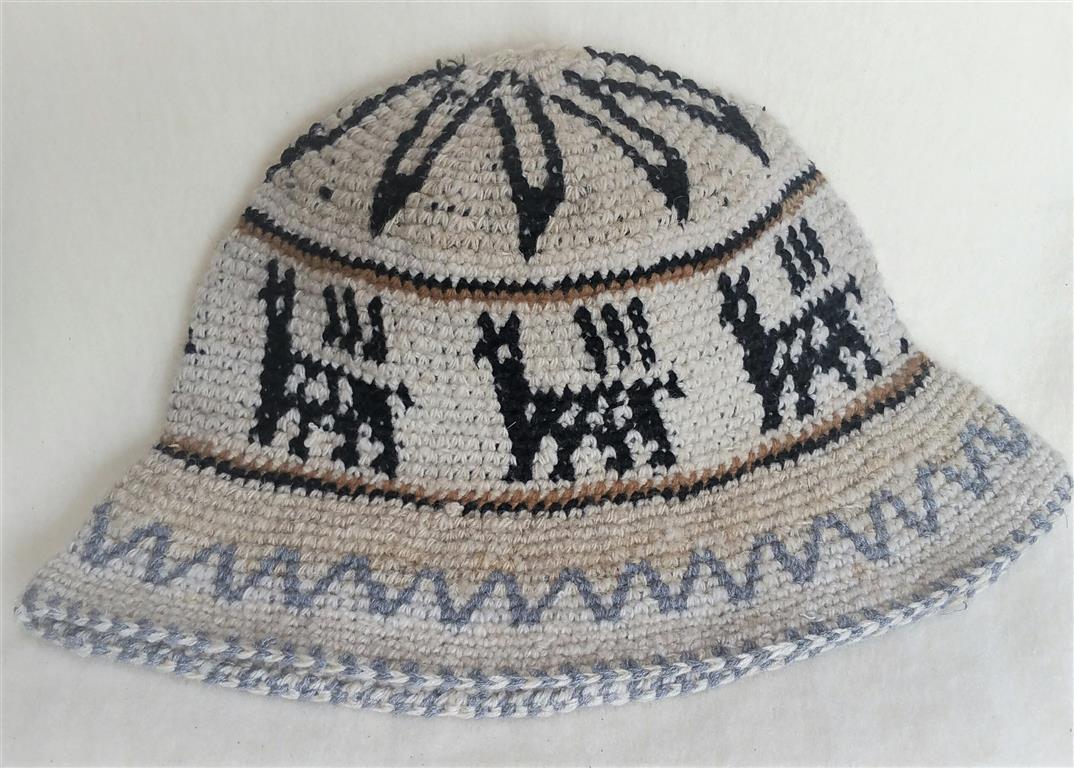 Hand Crochet Roll Up Rustic Alpaca Hat featuring unique patterns and cute alpaca designs, handmade in Peru, warm and comfortable for all ages.