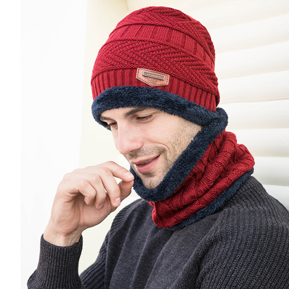 A cozy three-piece winter set including a knitted wool hat, scarf, and touchscreen gloves in vibrant colors.