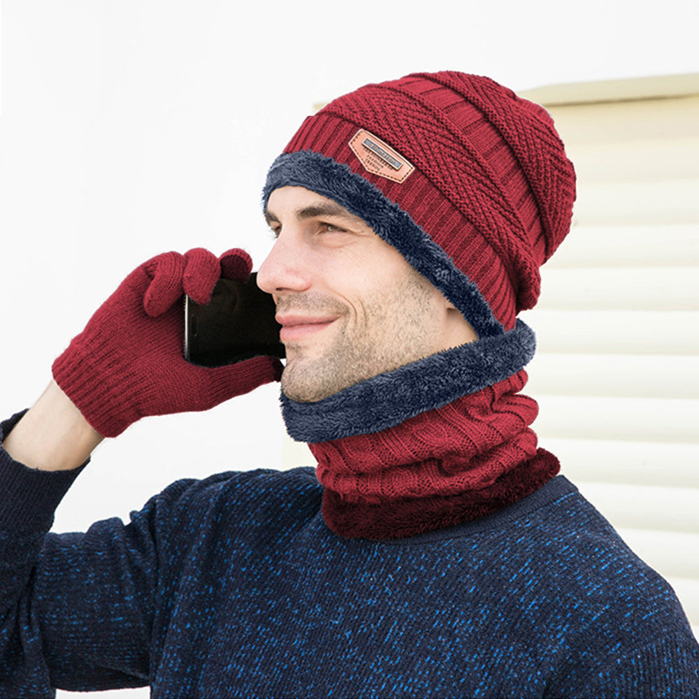 A cozy three-piece winter set including a knitted wool hat, scarf, and touchscreen gloves in vibrant colors.