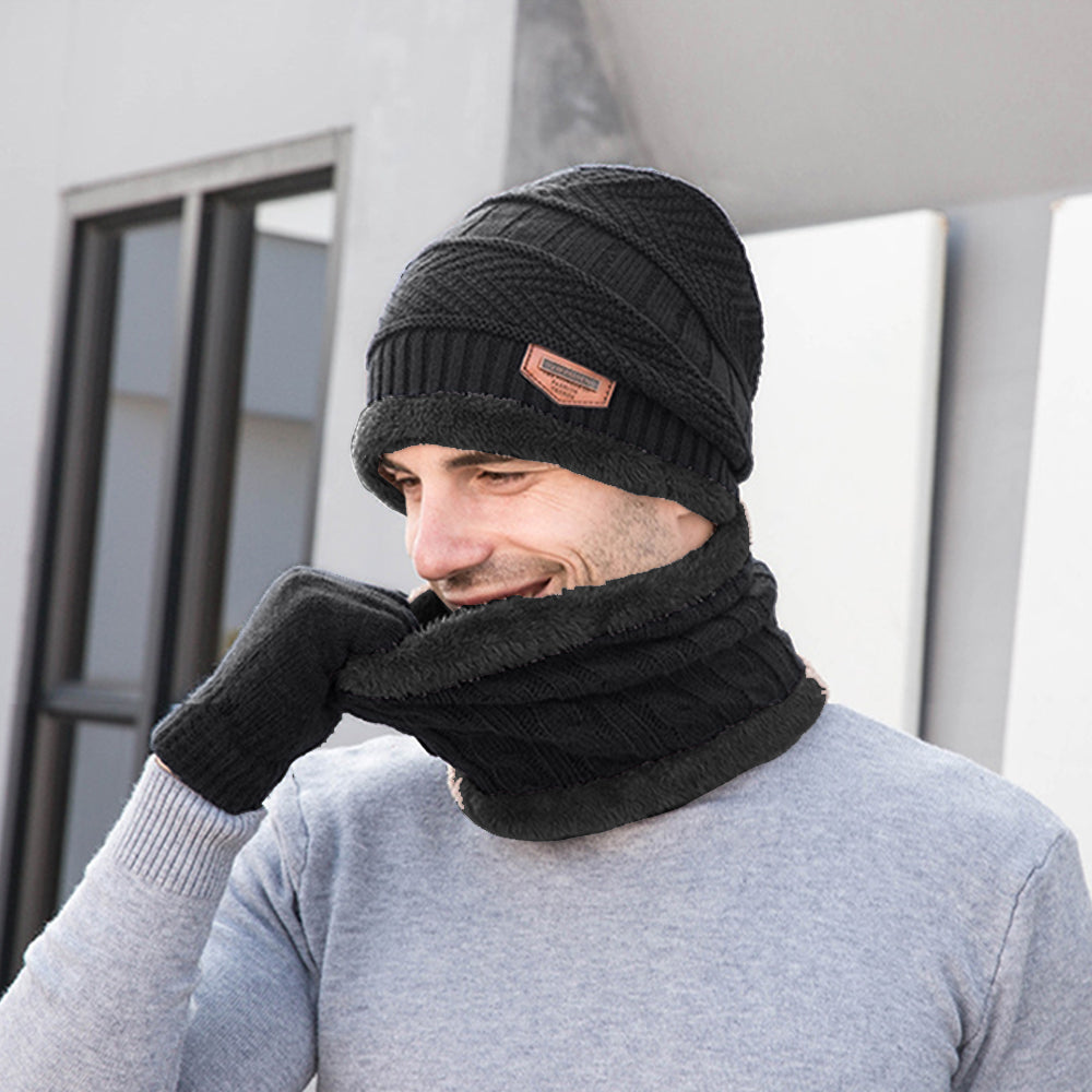 A cozy three-piece winter set including a knitted wool hat, scarf, and touchscreen gloves in vibrant colors.