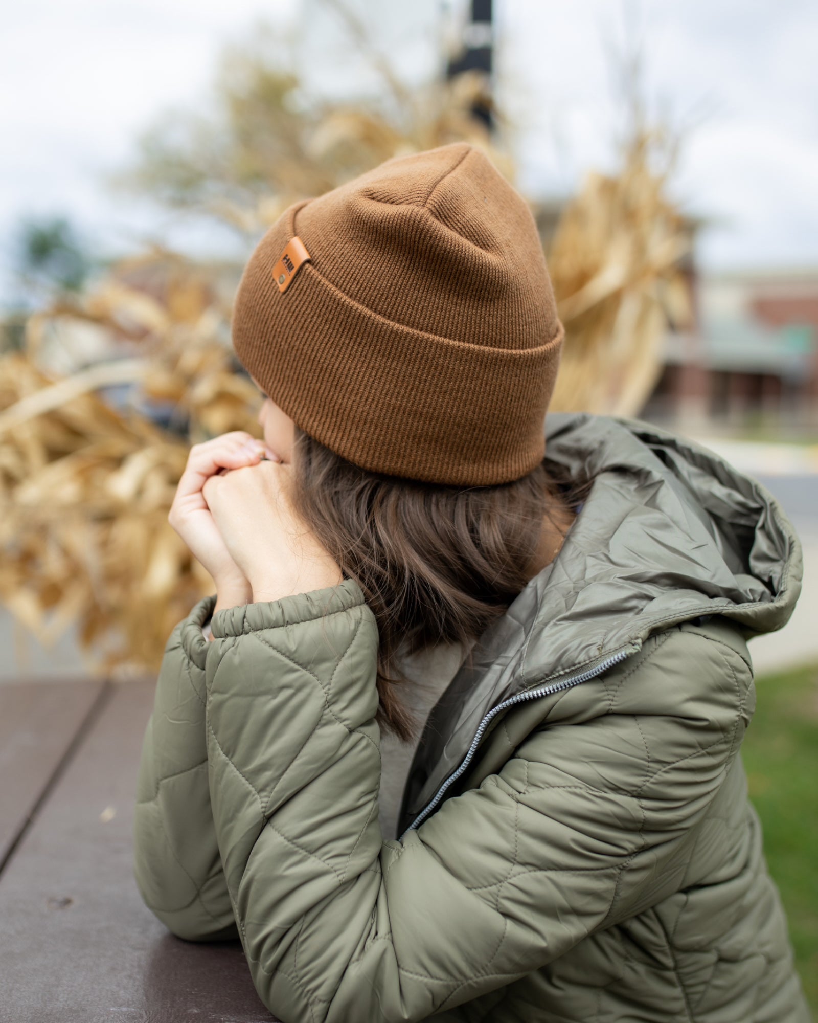 NEW HAAKWEAR Theta-Stitch Cuffed Beanie in Camel Brown, showcasing its unique design and comfortable fit.