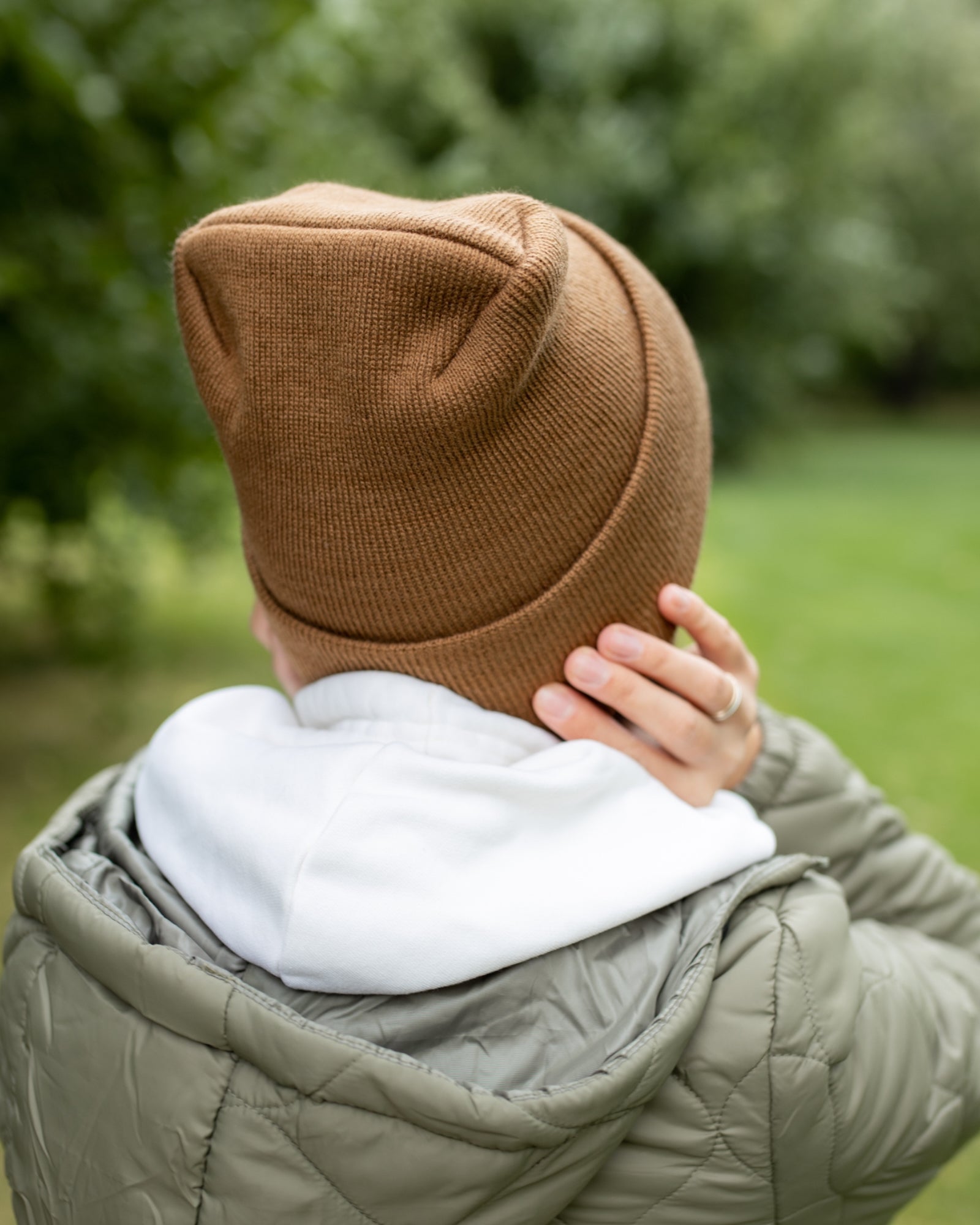 NEW HAAKWEAR Theta-Stitch Cuffed Beanie in Camel Brown, showcasing its unique design and comfortable fit.