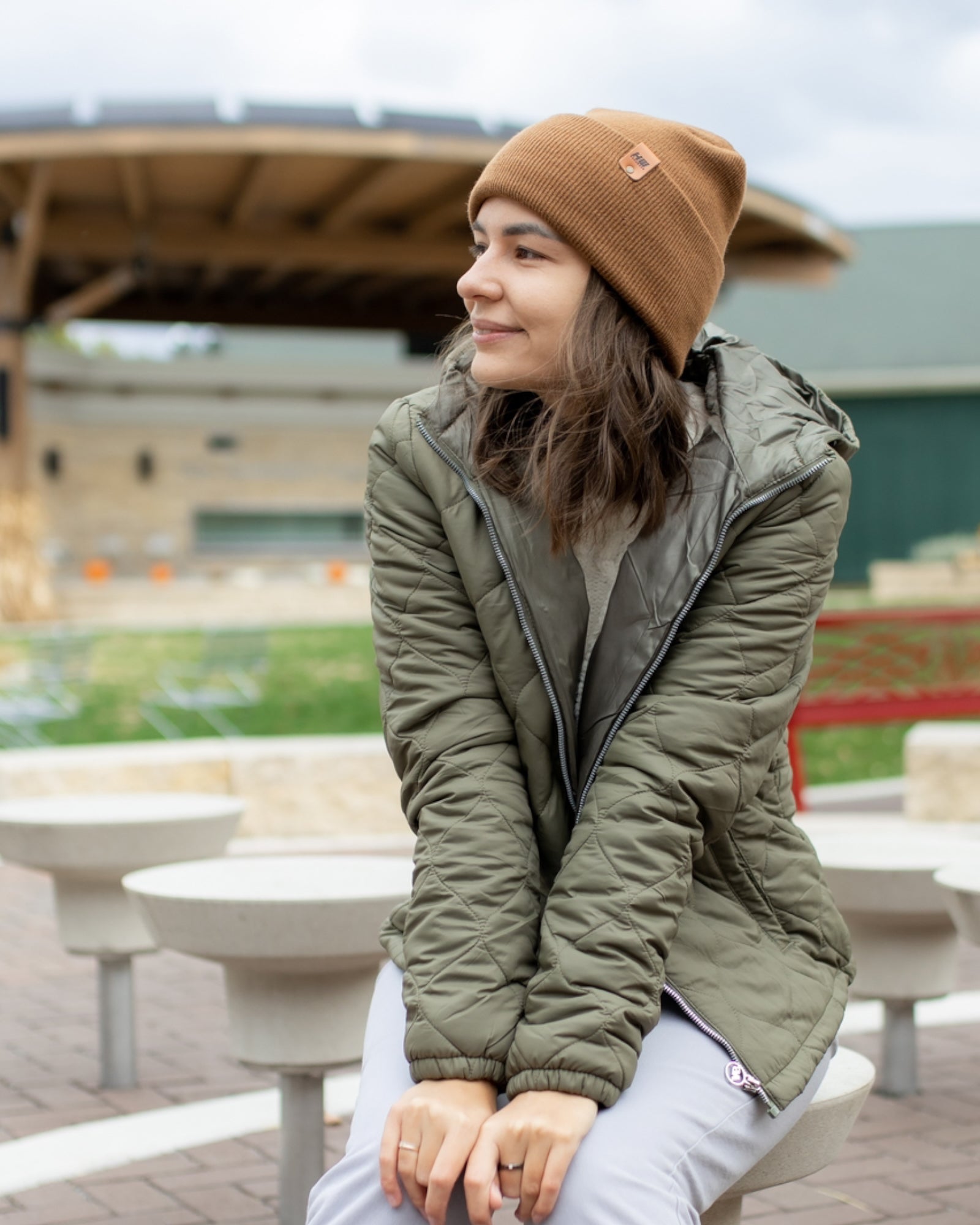 NEW HAAKWEAR Theta-Stitch Cuffed Beanie in Camel Brown, showcasing its unique design and comfortable fit.