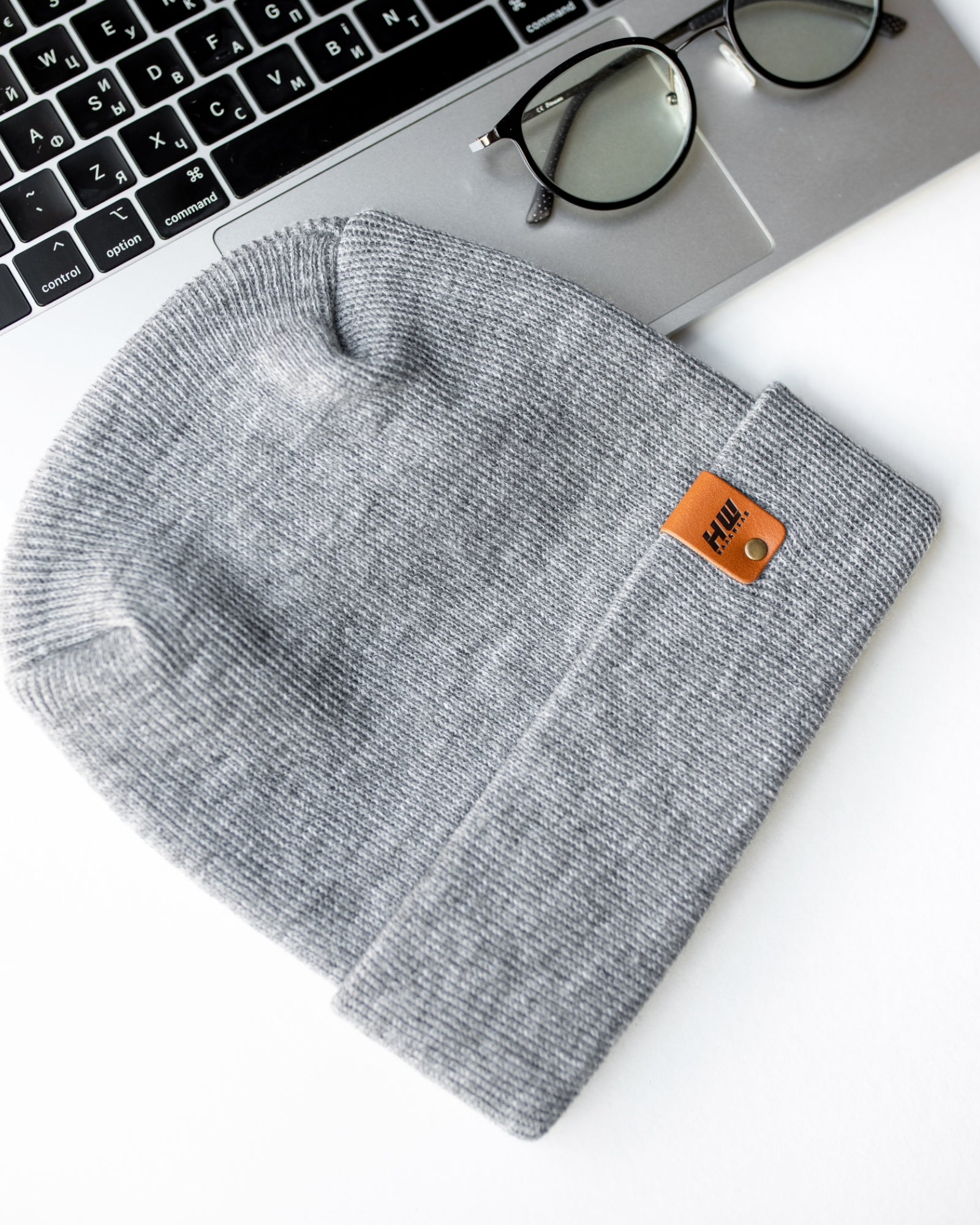 NEW HAAKWEAR Theta-Stitch Cuffed Beanie in Koala Gray, showcasing its unique design and comfortable fit.
