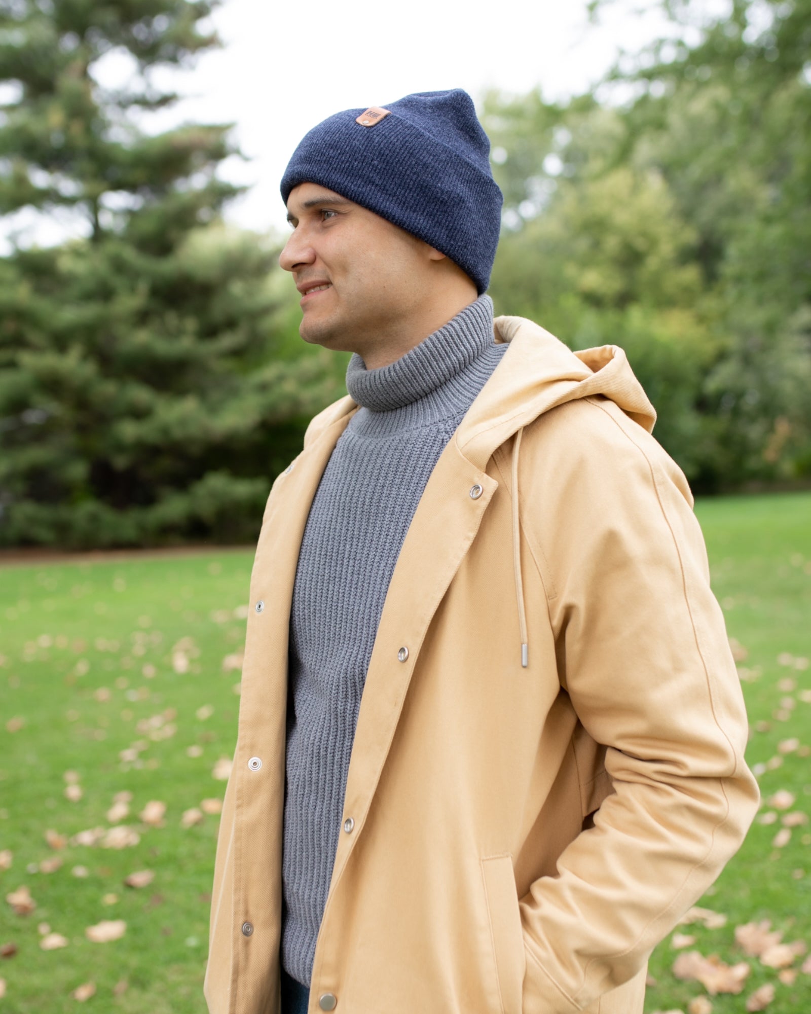 NEW HAAKWEAR Theta-Stitch Cuffed Beanie in Denim Blue, showcasing its unique design and comfortable fit.