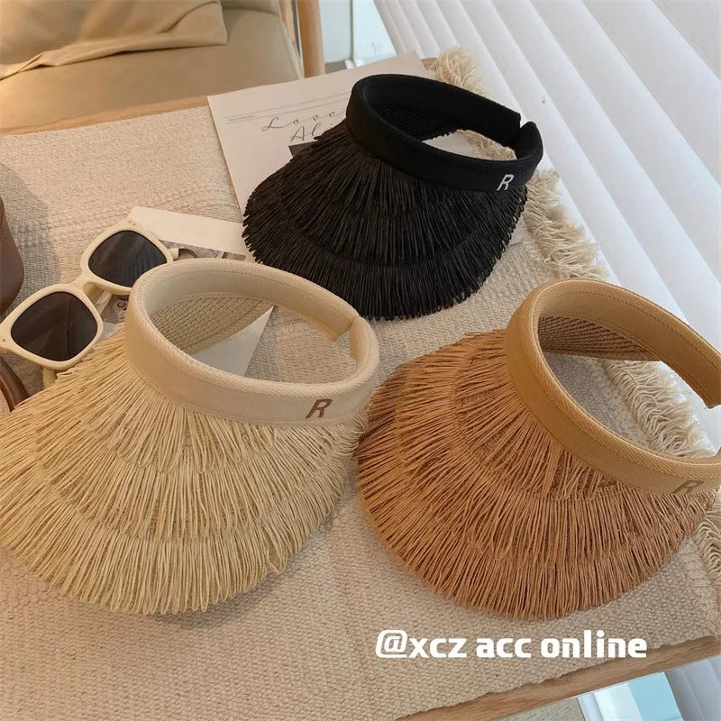 A stylish Summer Straw Sun Visor Hat from Sexikinis, made of high-quality straw and linen, perfect for sun protection and casual wear.