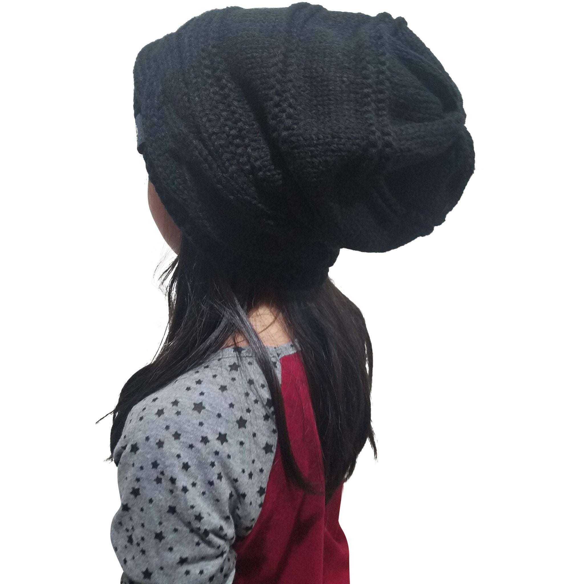 Warmest fleece lined slouch baggy women beanie hat in black, featuring a chunky cable knit design and soft plush lining for ultimate winter comfort.