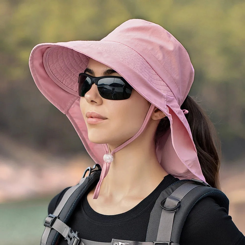 Wide large brim bucket hat in cotton, providing sun protection for outdoor activities.