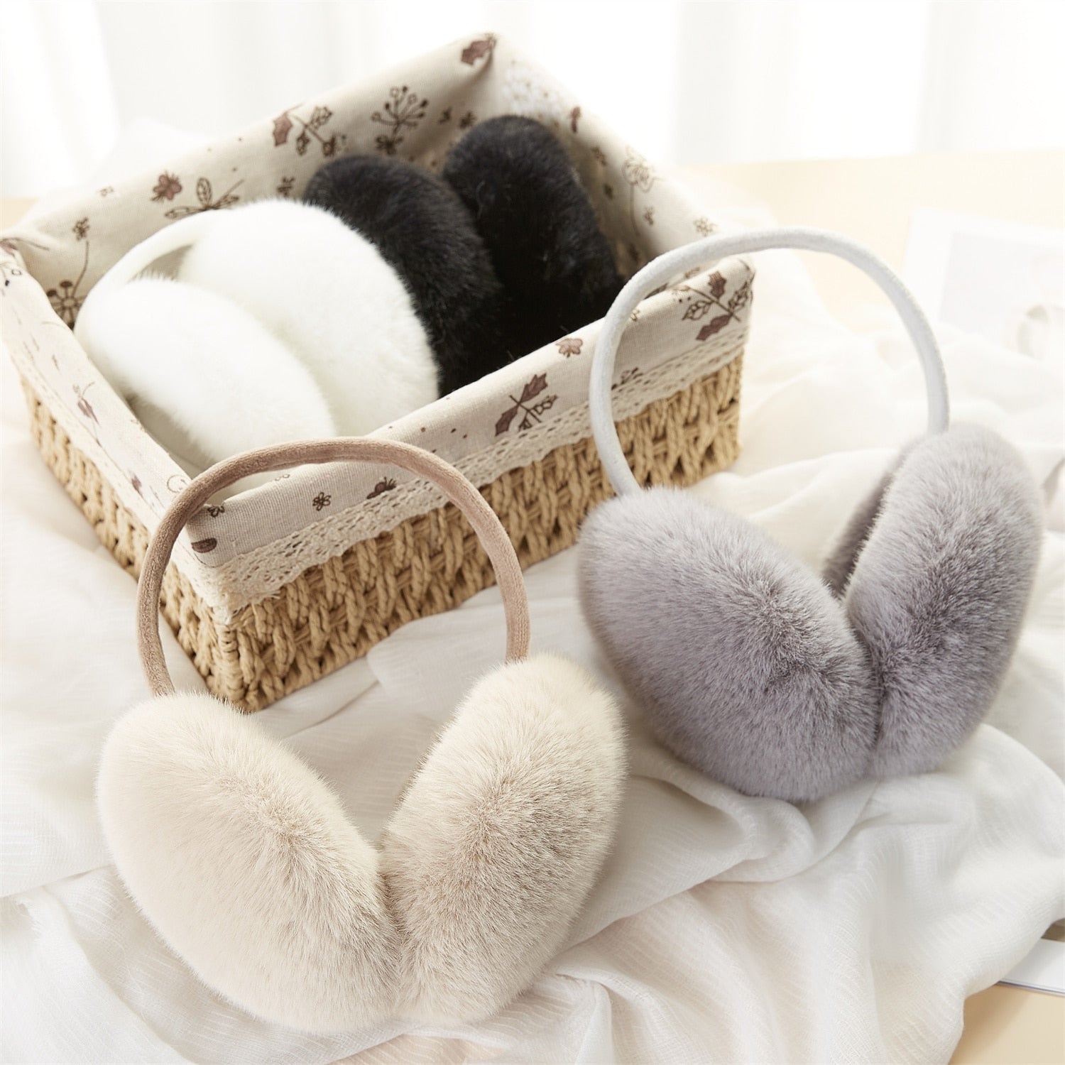Winter plush earmuffs in solid colors, designed for warmth and style for men, women, and children.
