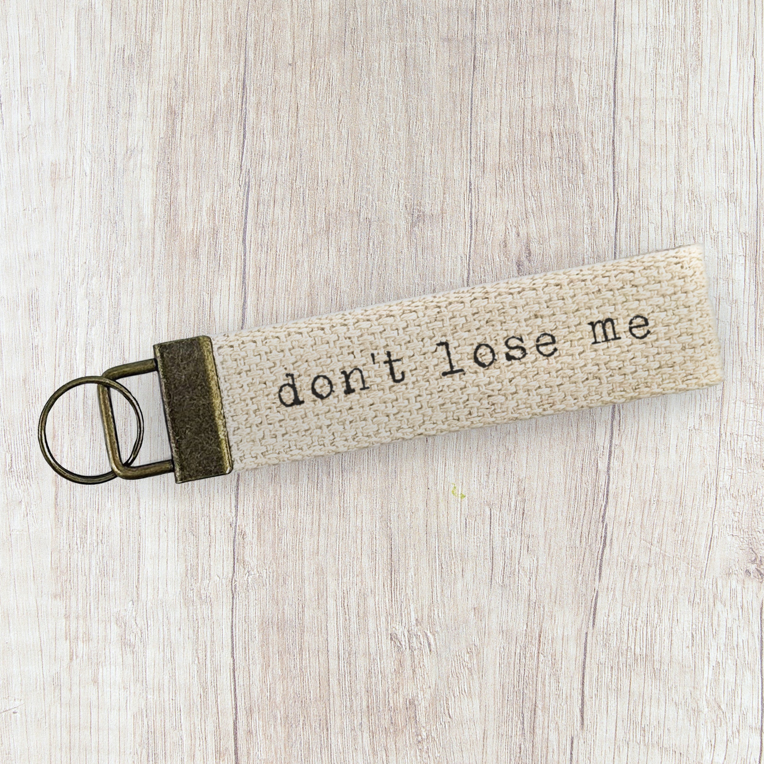 Don't Lose Me Canvas Key Fob featuring heavy-duty cotton webbing and bronze hardware, perfect for organizing keys.