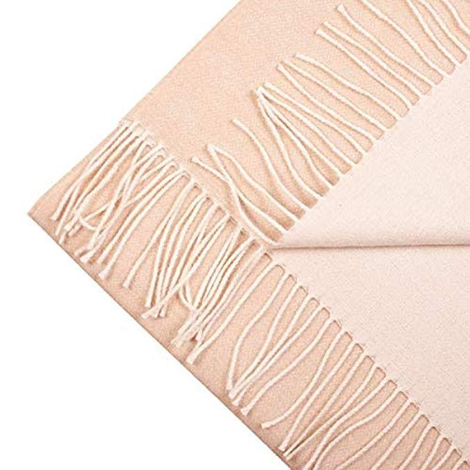 Luxurious beige-white 100% baby alpaca scarf, showcasing its soft texture and elegant design, perfect for winter wear.