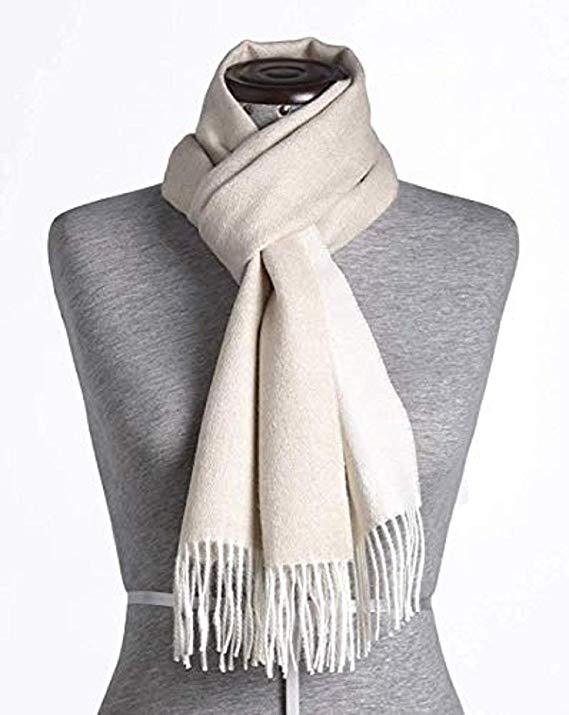 Luxurious beige-white 100% baby alpaca scarf, showcasing its soft texture and elegant design, perfect for winter wear.