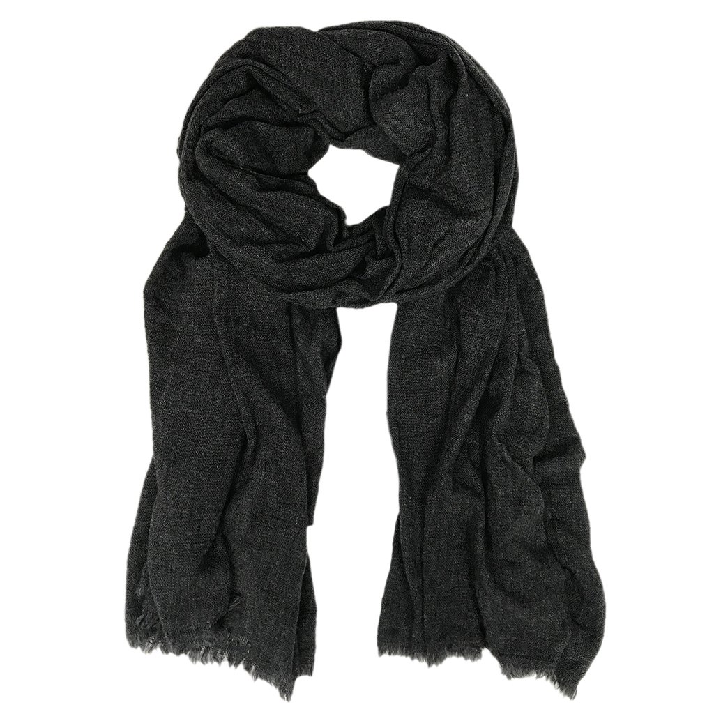 A luxurious Black Handloom Cashmere Scarf, oversized and soft, showcasing unique patterns and colors, handwoven by artisans in Nepal.