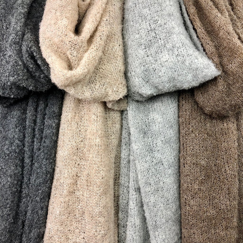 Charcoal Ultra Plush Alpaca Scarf displayed elegantly, showcasing its soft texture and oversized design, perfect for warmth and style.