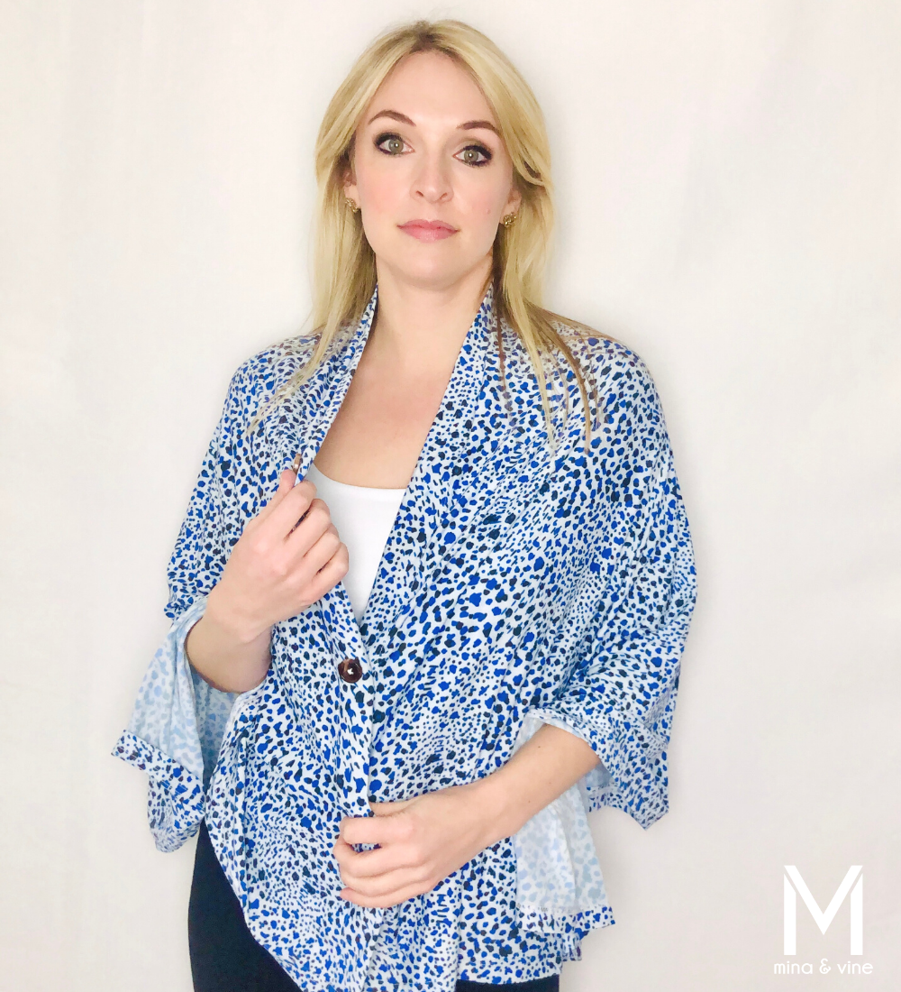 Cheeky Cheetah Multi-Way Smart Scarf featuring navy and mid-toned blue cheetah print, designed for nursing and versatile styling.