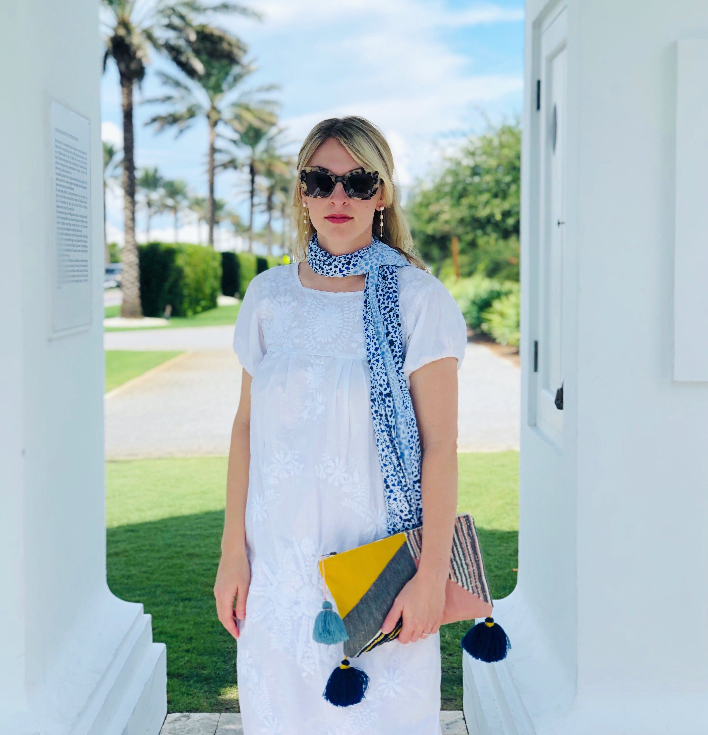 Cheeky Cheetah Multi-Way Smart Scarf featuring navy and mid-toned blue cheetah print, designed for nursing and versatile styling.