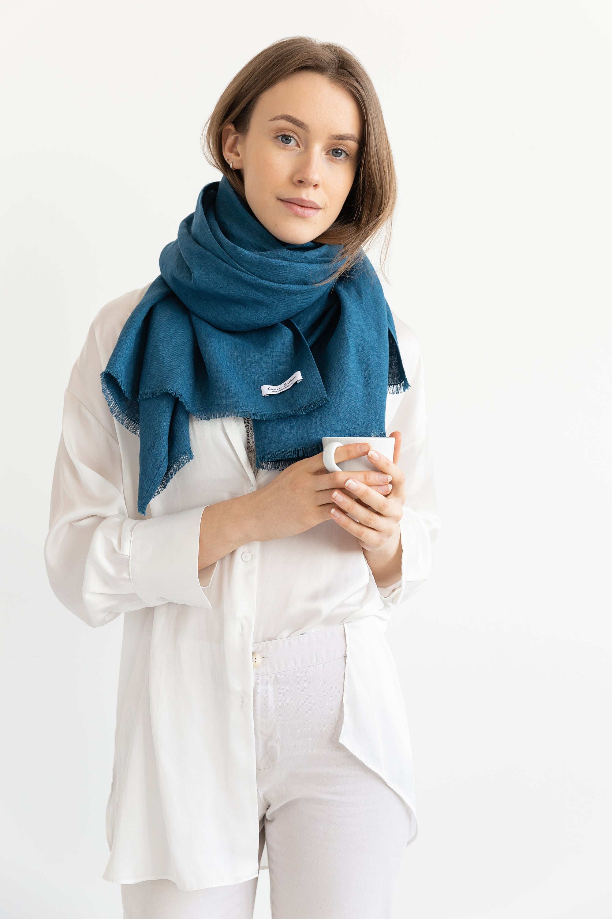 Cornflower Blue linen scarf made from 100% stonewashed linen, showcasing its elegant design and soft texture.