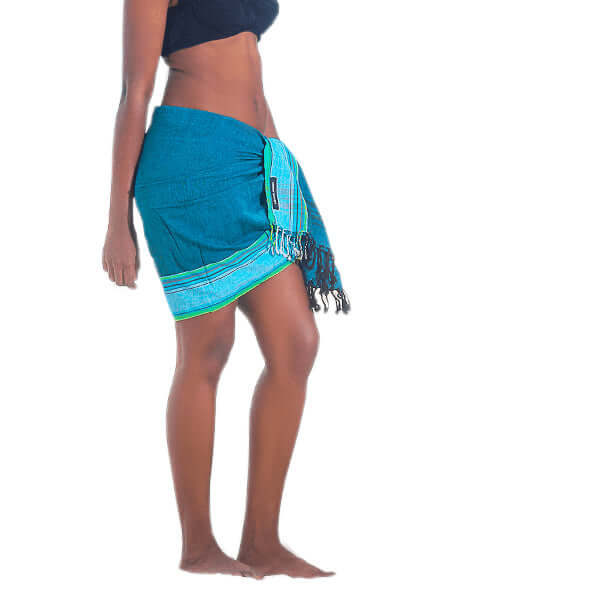 A vibrant blue Cotton African Kikoy Sarong, showcasing traditional hand-woven patterns, perfect for beachwear and versatile styling.