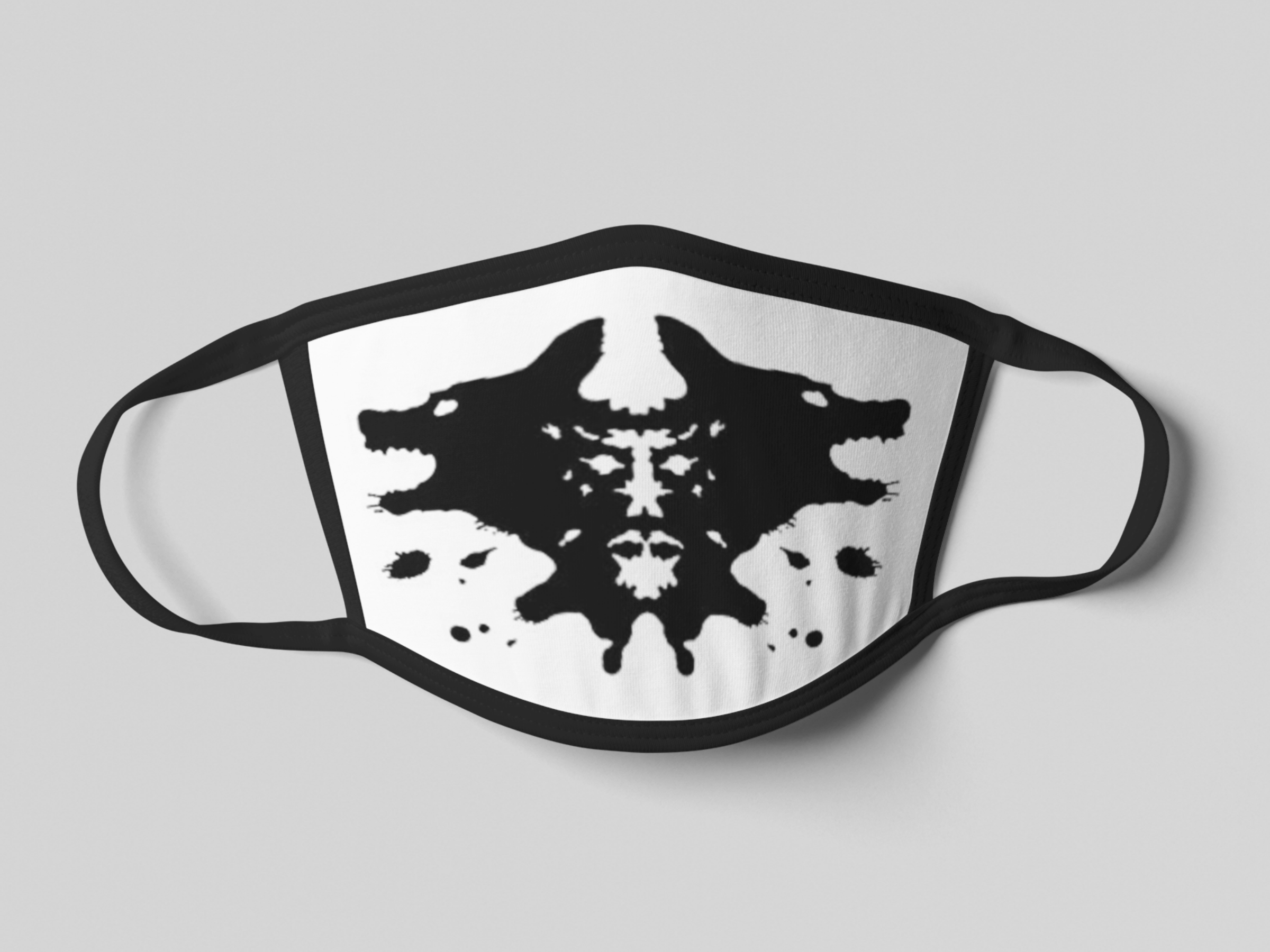 Cotton Double-Layer Face Cover featuring stylish printed designs and classic black, showcasing its reversible and washable features.