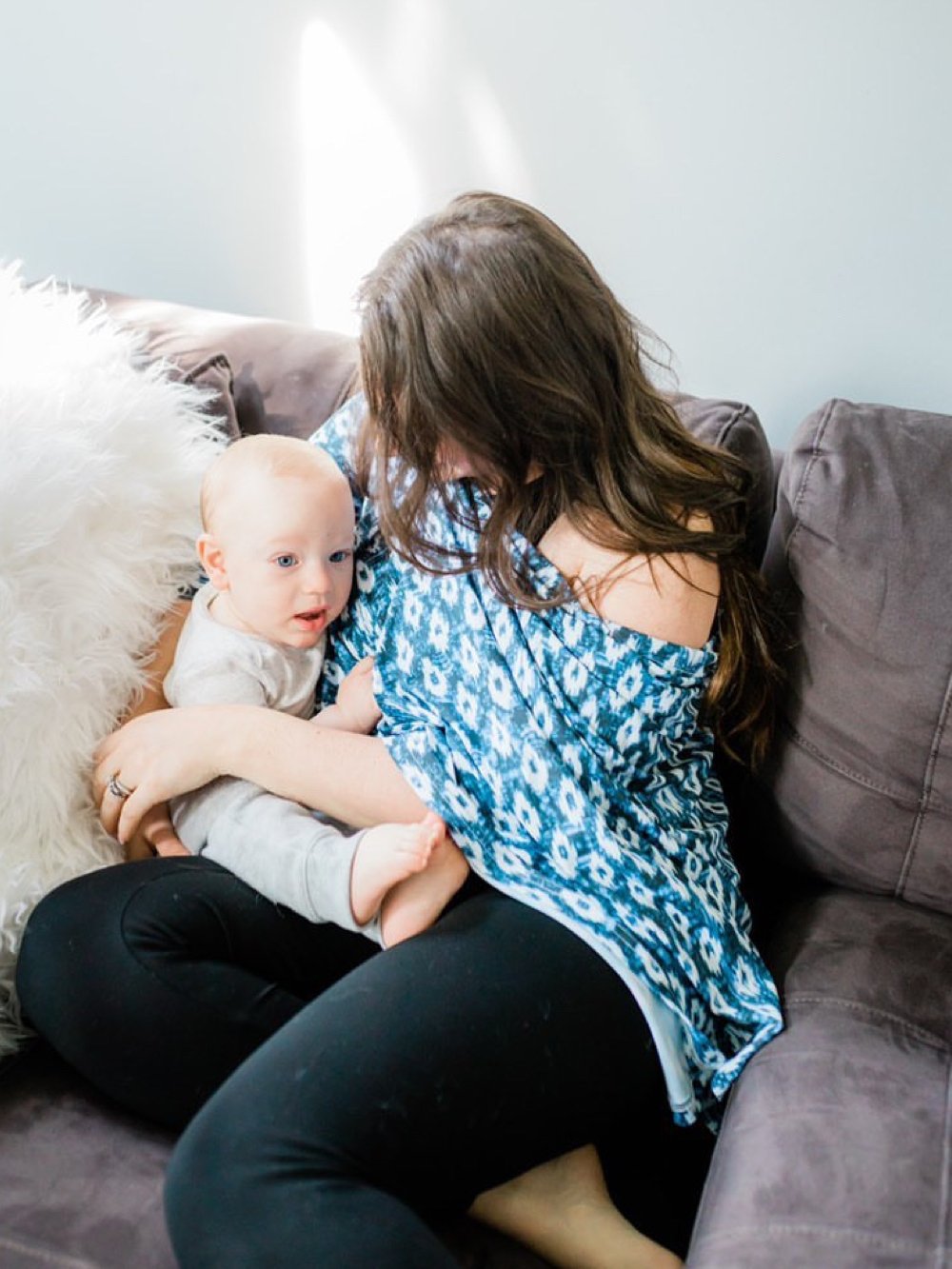 A stylish Eye-catching Ikat Multi-Way Smart Scarf featuring a vibrant Ikat print, designed for nursing and versatile use.