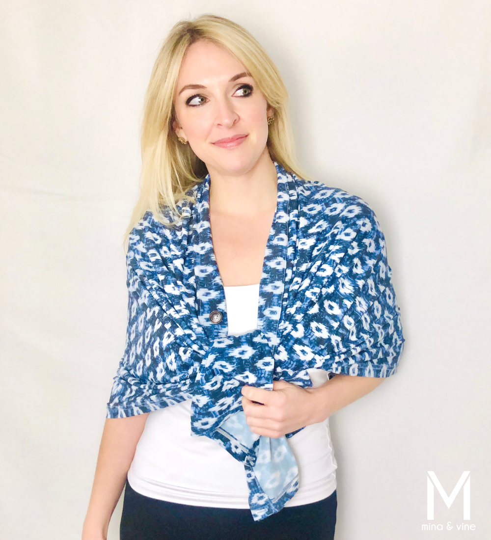 A stylish Eye-catching Ikat Multi-Way Smart Scarf featuring a vibrant Ikat print, designed for nursing and versatile use.