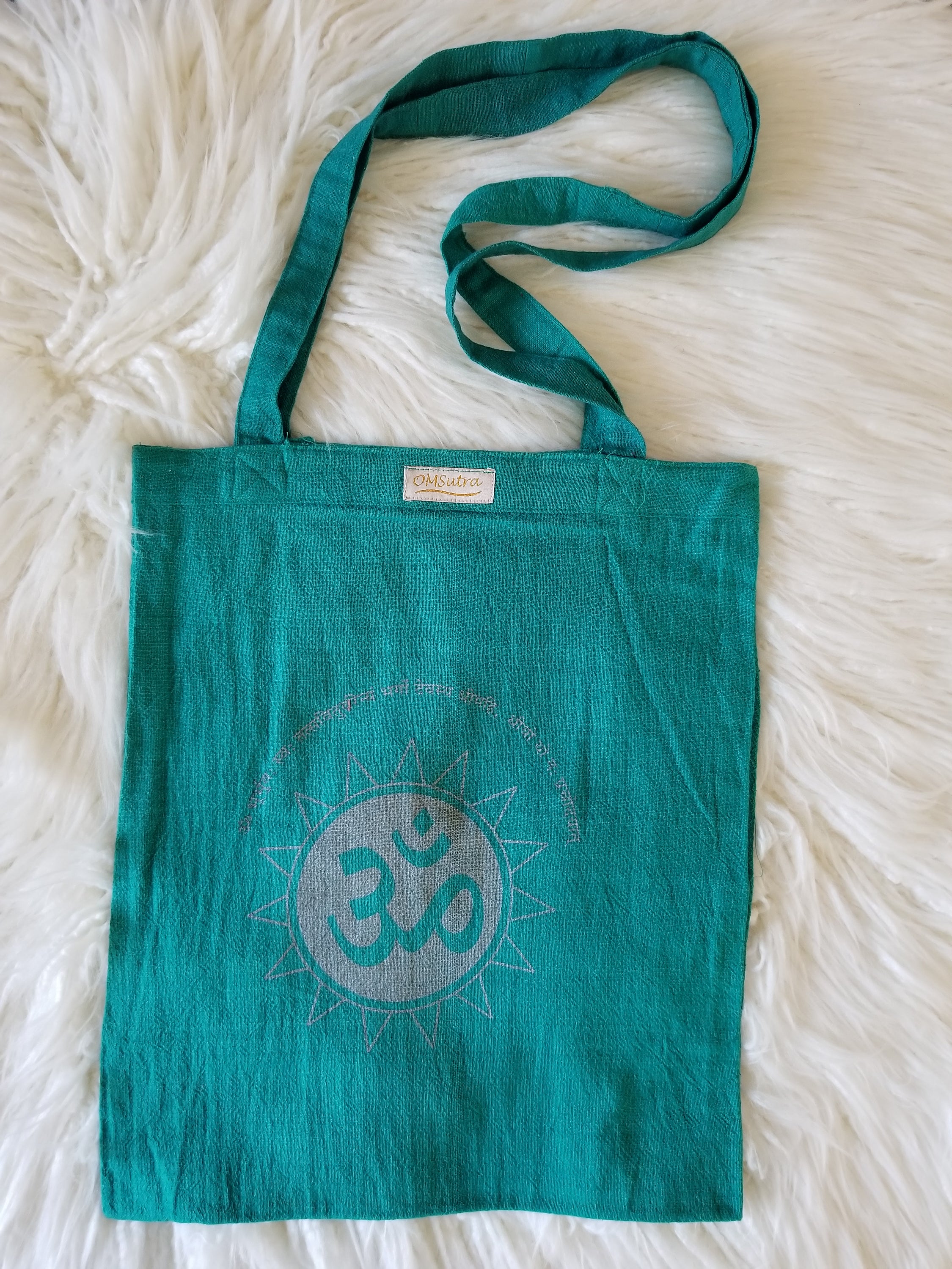 Eco-friendly Gayatri Mantra Tote Bag made from handwoven cotton, featuring the Gayatri Mantra in Sanskrit and English.