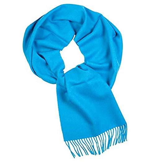 Luxurious blue scarf made from 100% baby alpaca wool, showcasing its soft texture and elegant design.