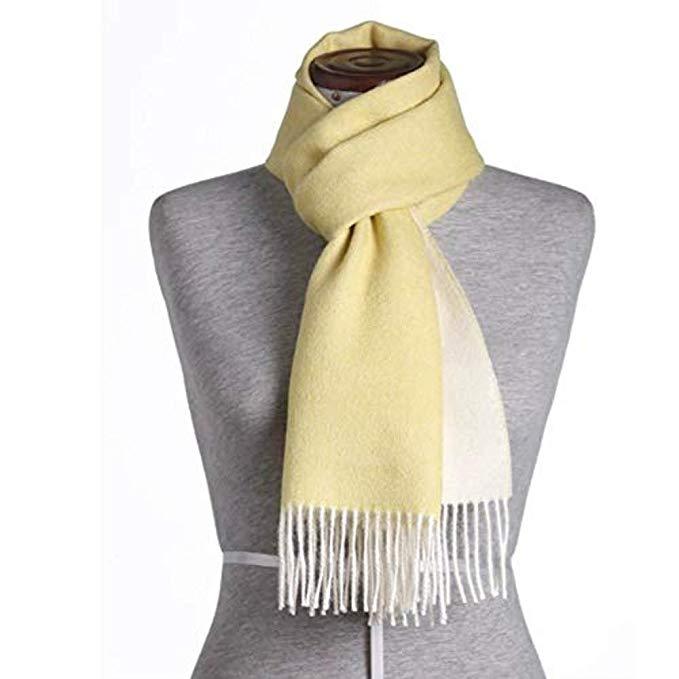 Luxurious yellow-white 100% baby alpaca scarf, soft and elegant, perfect for winter wear.