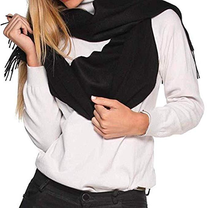 Luxurious black scarf made from 100% super baby alpaca wool, showcasing its soft texture and elegant design.