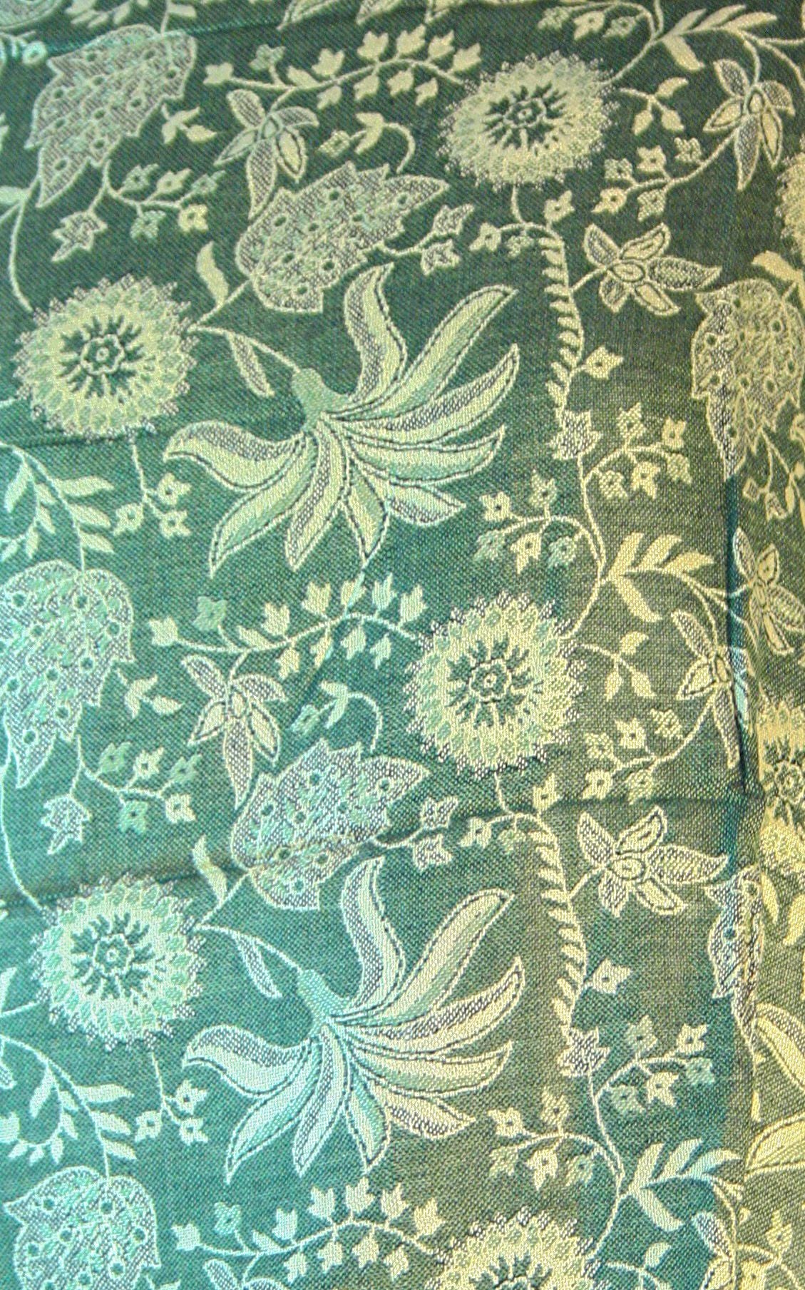 Green Floral Leaf Pashmina showcasing a reversible design with vibrant colors and elegant tassel finish, measuring 200 x 75cm.