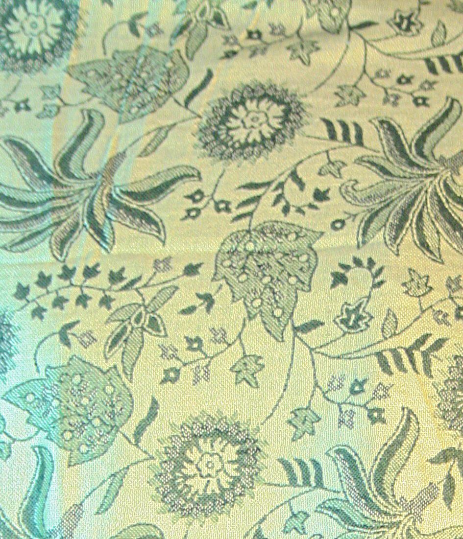 Green Floral Leaf Pashmina showcasing a reversible design with vibrant colors and elegant tassel finish, measuring 200 x 75cm.