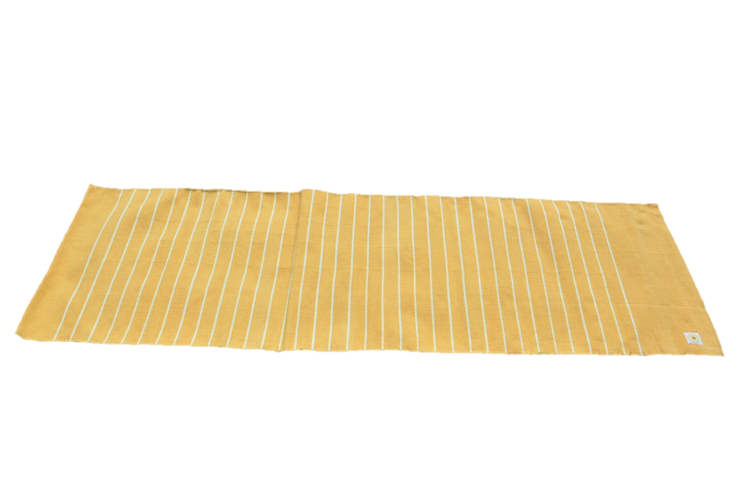 Handwoven cotton yoga rug featuring OM design, fringes, and vibrant colors, ideal for meditation and yoga practice.